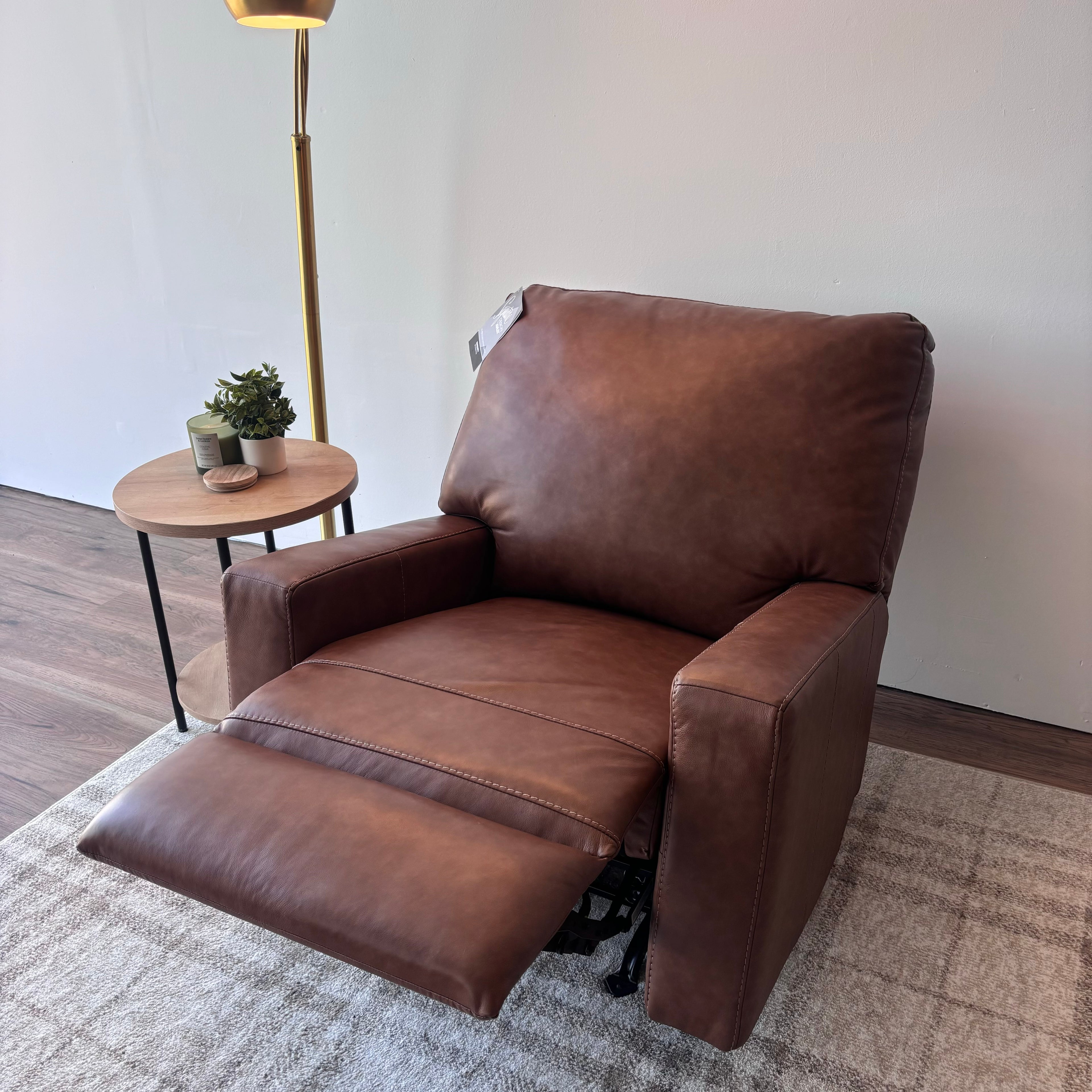 Ashley Bolsena Leather Rocker Recliner — Caramel Brown